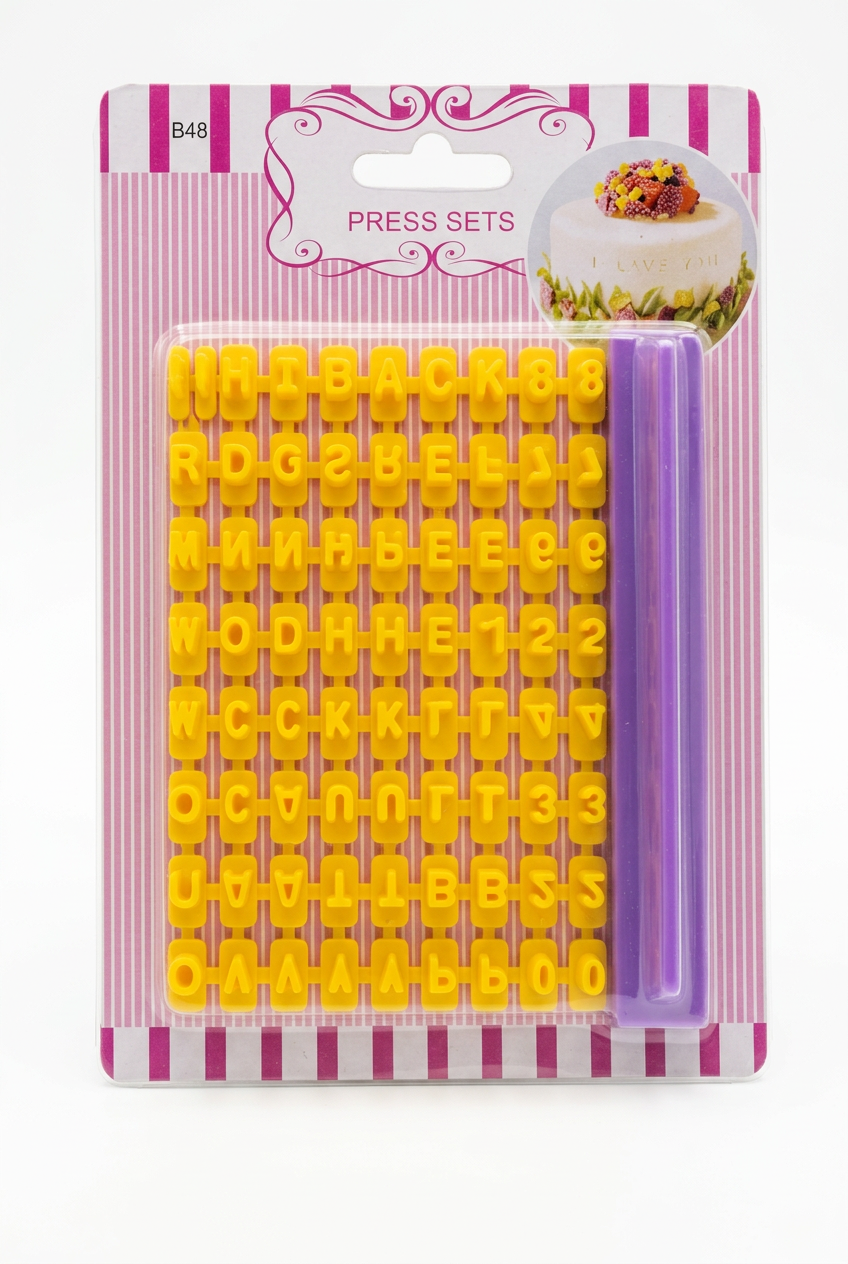 Letter press stamp set with yellow number and letter punches, in purple storage tray