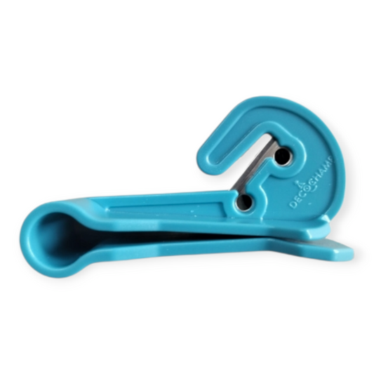 Turquoise ribbon and tape cutter with handle and blade guide