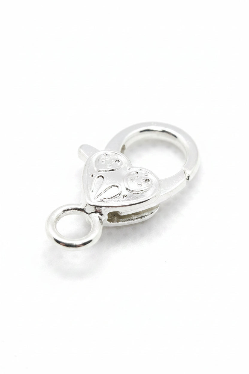 Silver lobster claw charm with heart and round loop