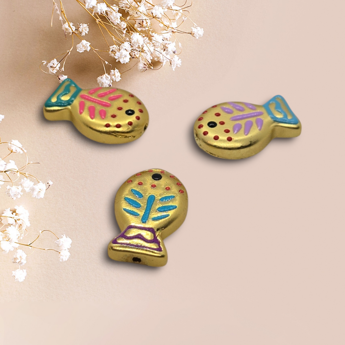 Gold plastic fish pendants with colorful enamel-style accents, for jewelry making