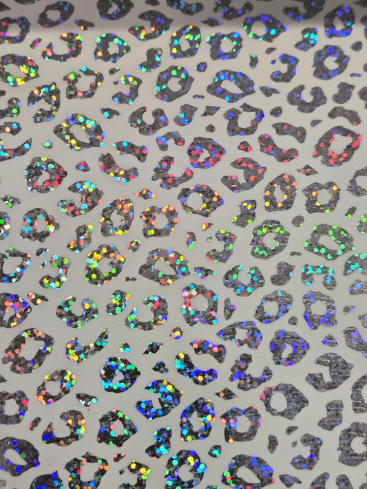 Iridescent leopard print metallic vinyl sheet with holographic multicolor spots