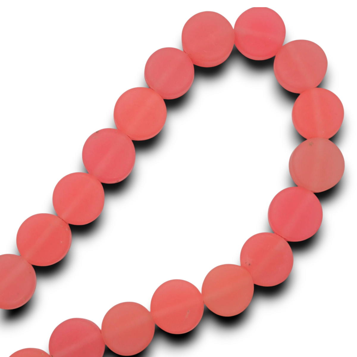 Pink flat rondelle resin bead strand, round-disc beads in a loop