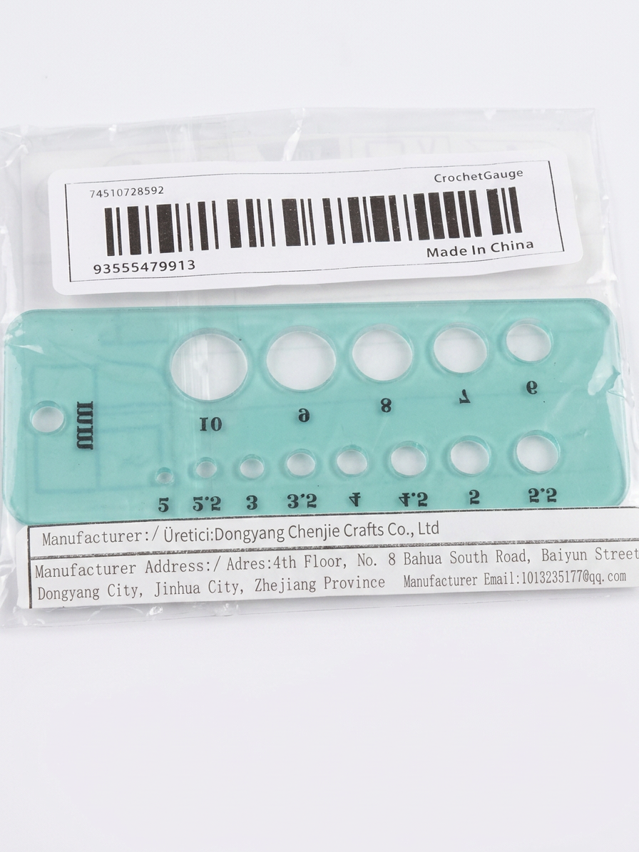 Beads size gauge tool with circular size holes on aqua blue measurement board