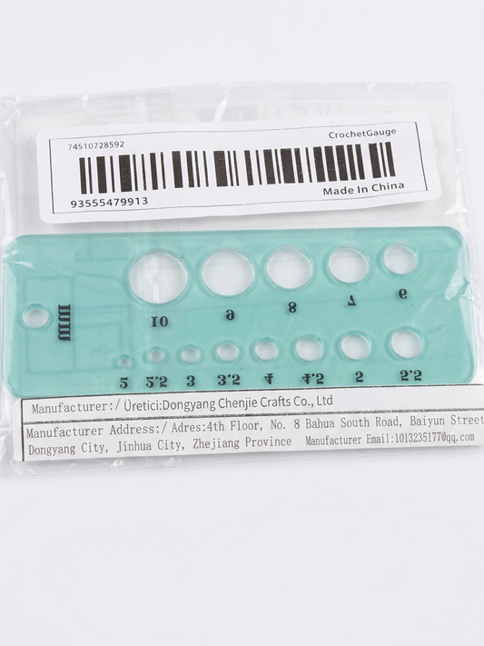 Beads size gauge tool with circular size holes on aqua blue measurement board