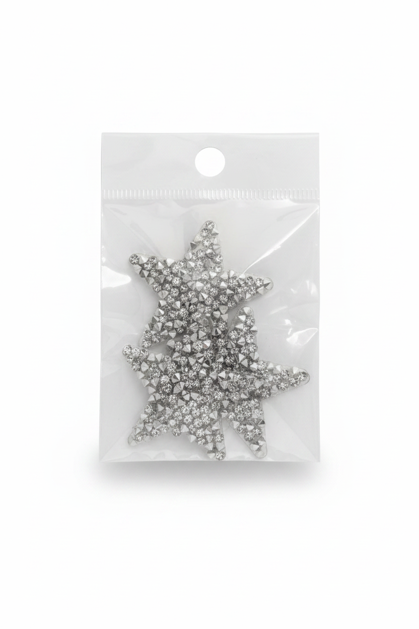Silver rhinestone star applique with sparkling crystal stones, in a clear pack
